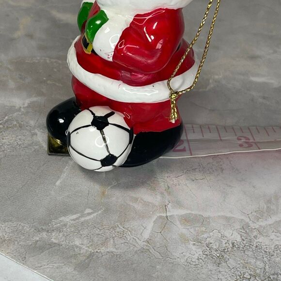 Vintage 1980’s hand painted Santa kicking a soccer ball. - Picture 3 of 9